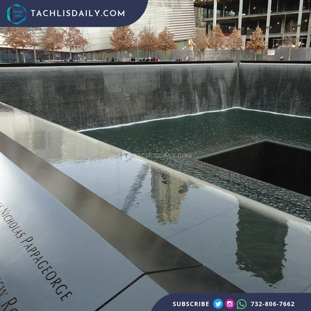 The reflecting pool and engraved panels at the 9/11 Memorial.